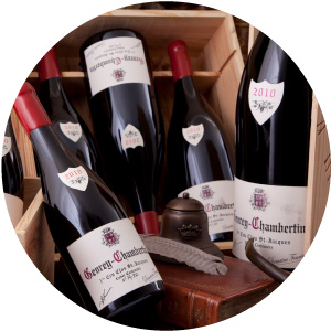 bottles of Fourrier Gevrey Chambertin with original wooden case. Historical props