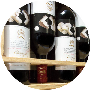 bottles of 1986 Mouton on a rack